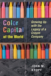 封面显示四个彩色蜡笔盒用过的蜡笔。